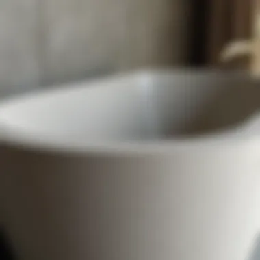 Detail view of the smooth finish of a custom concrete bathtub