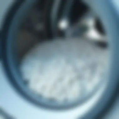 Close-up of laundry scent booster beads dissolving in a washing machine