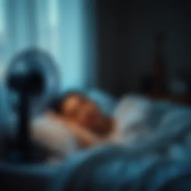 Person enjoying a restful sleep with a fan