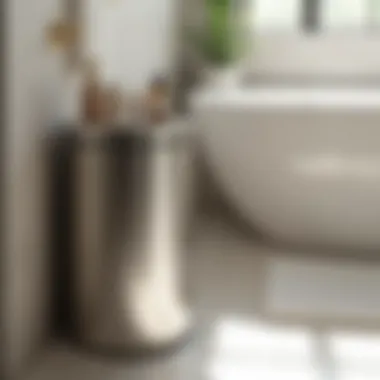 Polished nickel trash can paired with complementary bathroom accessories